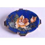 A CHARMING ANTIQUE GOLD LAPIS PIETRA DURA BROOCH. 3.5 cm x 2.5 cm.