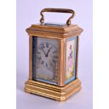 A MINIATURE BRASS AND PORCELAIN CARRIAGE CLOCK. 9 cm high inc handle.