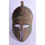 A ROMAN STYLE METAL HELMET. 34 cm high.