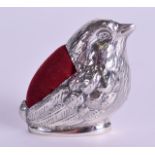 A SILVER BIRD PIN CUSHION. 4.5 cm wide.