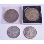 FOUR SILVER COINS. (4)