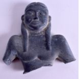 A CARVED EGYPTIAN STONE FIGURE. 10 cm x 10 cm.