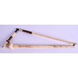 A RARE 19TH CENTURY CENTURY CONTINENTAL IVORY FOLDING PARASOL HANDLE. 60 cm long overall.