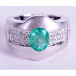 A GOOD 18CT WHITE GOLD EMERALD AND DIAMOND RING. 15.2 grams. Size N.