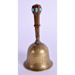 A CONTINENTAL BRONZE AND TURQUOISE BELL. 9.5 cm high.