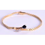 A 14CT GOLD DIAMOND AND SAPPHIRE BRACELET. 6.8 grams. 17 cm long.