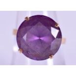 AN 18CT GOLD AMETHYST RING. 6.3 grams. Size N.