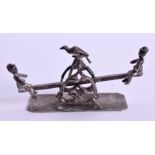 AN ANTIQUE SILVER SEE SAW. 5.5 cm wide.