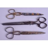 THREE PAIRS OF 18TH/19TH CENTURY SWEDISH DAMASCENED SCISSORS one stamped Eskilstuna. Largest 17 cm