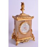 A 19TH CENTURY FRENCH GILT BRONZE CHAMPLEVE ENAMEL MANTEL CLOCK with Aesthetic Movement finial. 31