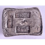 A CHINESE WHITE METAL INGOT. 198 grams. 4 cm x 5.5 cm.