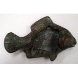 A CHINESE BRONZE BRUSH WASHER IN THE FORM OF A FISH, of flattened form. 14 cm wide.
