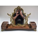 AN EARLY 20TH CENTURY ORMOLU MOUNTED DRESSING TABLE MIRROR, inlaid with mixed wood depicting foliag