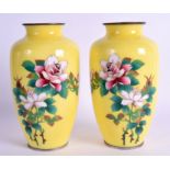 A PAIR OF EARLY 20TH CENTURY JAPANESE MEIJI PERIOD CLOISONNÉ ENAMEL VASES decorated with flowers up