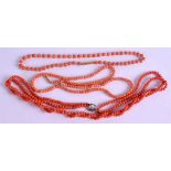 THREE ANTIQUE CORAL NECKLACES, one formed with pearl spacers. (3)