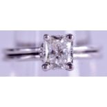 A FINE 18CT WHITE GOLD EMERALD CUT SOLITAIRE DIAMOND RING of approx. 1.35 ct, Colour F, S I2. 5 gra