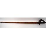 AN ANTIQUE NAVAL SWORD, formed with a leather scabbard and shagreen handle. 104 cm.