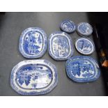 A QUANTITY OF ENGLISH BLUE AND WHITE POTTERY, platters and plates etc. (qty)