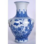 A CHINESE BLUE AND WHITE PORCELAIN VASE BEARING KANGXI MARKS, formed with mask head handles and dec