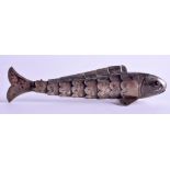 AN ANTIQUE SILVER AND GARNET RETICULATED FISH. 15 cm long.