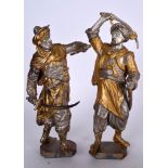 A PAIR OF SPELTER FIGURE OF TURKS, modelled holding swords upon shaped plinths. 34 cm & 31 cm.