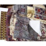 A QUANTITY OF EASTERN SILKS AND EMBROIDERY, varying size and decoration. (qty)