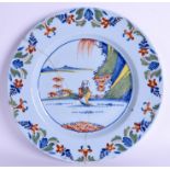 A LARGE 18TH CENTURY LONDON LAMBETH POLYCHROME DELFT DISH painted with a seated Chinese male. 34.5