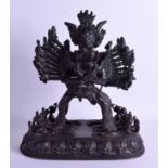 A LARGE 19TH CENTURY TIBETAN BRONZE FIGURE OF VAJRABHAIRAVA AND SHAKTI upon an openwork base. 31 cm