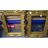 A SET OF FOUR 19TH CENTURY ITALIAN GILTWOOD PICTURE FRAMES, formed with scrolling floral decoratio