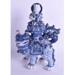 A 19TH CENTURY JAPANESE MEIJI PERIOD BLUE AND WHITE BUDDHISTIC LION. 26 cm x 15 cm.