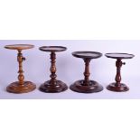 A CHARMING SET OF FOUR 18TH/19TH CENTURY CARVED FRUITWOOD TREEN ADJUSTABLE TABLES. Largest 25 cm x