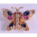 A 14CT YELLOW GOLD BUTTERFLY BROOCH, inset with diamond, sapphire and ruby. 2.5 cm wide & 5 grams.