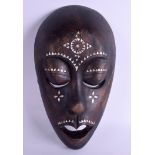 AN AFRICAN MOTHER OF PEARL INLAID TRIBAL WOOD MASK. 16 cm x 30 cm.