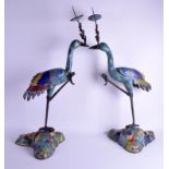 A LARGE PAIR OF 1920S CHINESE CLOISONNÉ ENAMEL PRICKET BIRDS decorated with foliage. 70 cm high.