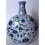 A HUGE CHINESE MING STYLE PORCELAIN FLASK, decorated with stylised foliage and vines. 46 cm high.