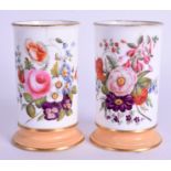 A PAIR OF EARLY 19TH CENTURY CONTINENTAL PORCELAIN SPILL VASES painted with flowers. 9 cm high.