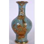 A 20TH CENTURY CHINESE PALE GLAZED PORCELAIN VASE BEARING QIANLONG MARKS, overlaid with gilt metal