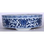 A 20TH CENTURY CHINESE BLUE AND WHITE PORCELAIN BRUSH WASHER BEARING QIANLONG MARKS, painted with s