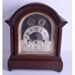 AN ANTIQUE MAHOGANY MANTEL CLOCK with Junghans movement. 37 cm x 27 cm.