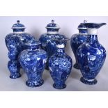 A GROUP OF BLUE AND WHITE WEDGWOOD BLUE AND WHITE PORCELAIN VASE, varying size and style. (7)