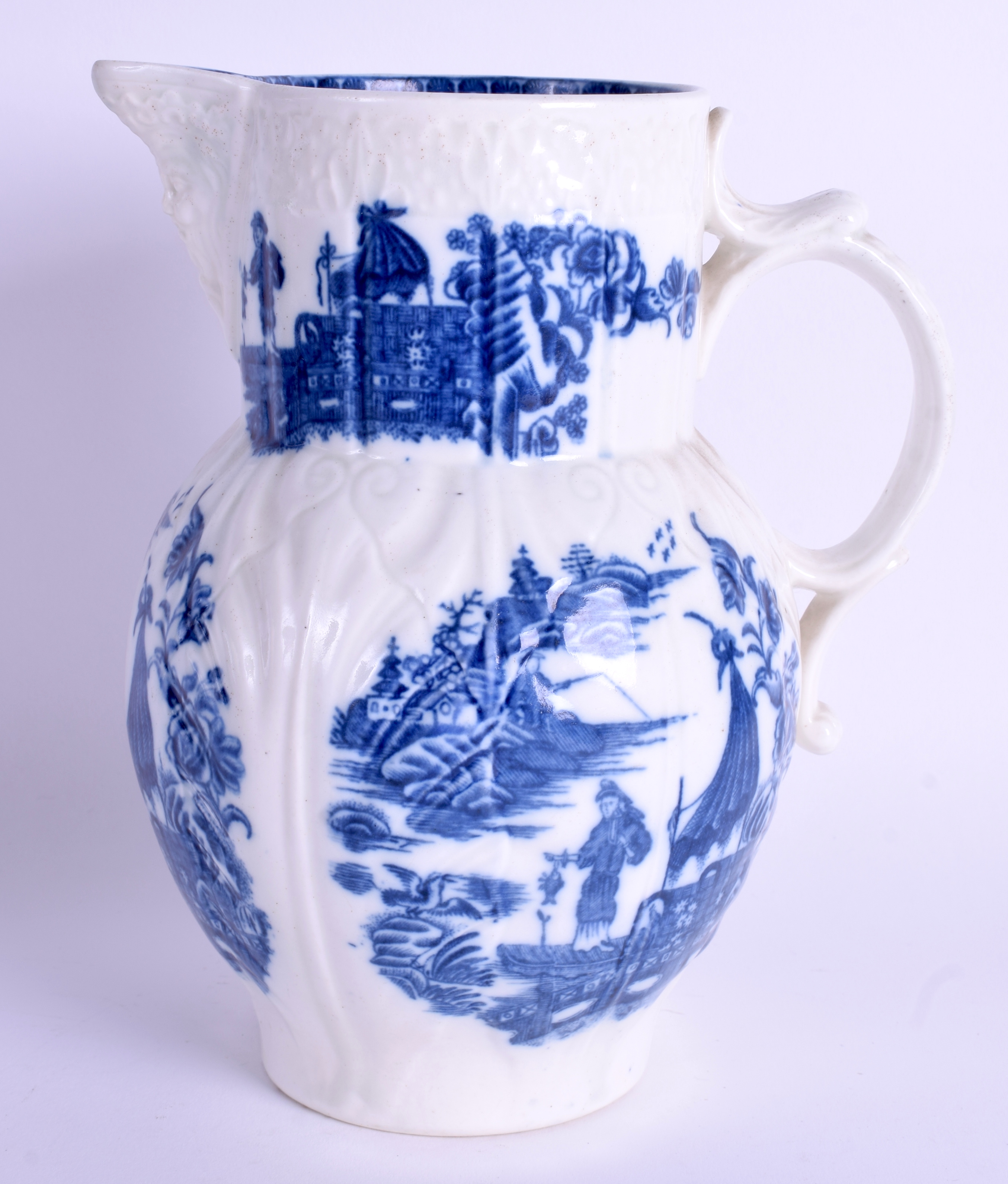 AN 18TH CENTURY CAUGHLEY CABBAGE LEAF MOULDED JUG printed with the fisherman pattern. 19 cm high. - Image 2 of 3
