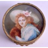 AN EARLY 20TH CENTURY EUROPEAN PAINTED IVORY PORTRAIT MINIATURE BOX decorated with swirling motifs.