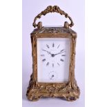 A 19TH CENTURY FRENCH ART NOUVEAU BRASS REPEATING CARRIAGE CLOCK Hotto A Paris, decorated with foli