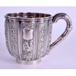 A 19TH CENTURY CHINESE EXPORT SILVER SCALLOPED MUG by Luen Wo, decorated with figures, flowers and