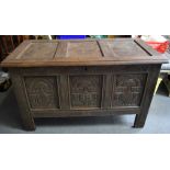 AN ANTIQUE OAK COFFER ON STAND, formed with carved panels and signed “SH '89”. 73 cm x 121.