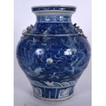 A 20TH CENTURY CHINESE BLUE AND WHITE PORCELAIN VASE, decorated with a dragon opposing the phoenix