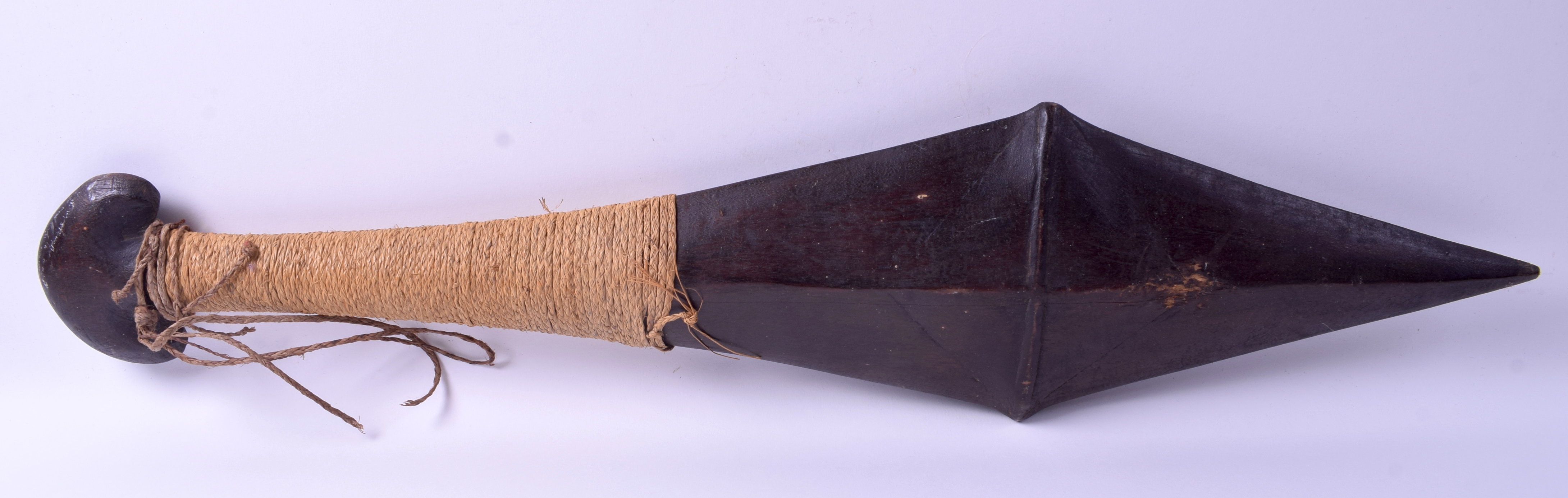 A RARE SOLOMON ISLANDS POLYNESIAN TRIBAL WAR CLUB Melanesia, with rope banded handle. 76 cm x 17 cm