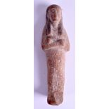 AN EGYPTIAN CARVED USHABTI FIGURE. 18 cm high.