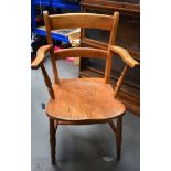 AN EARLY 20TH CENTURY OAK CHAIR, turned legs. 90 cm high.