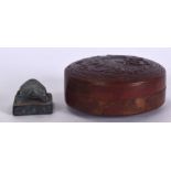 A CHINESE CIRCULAR COPPER BOX, together with a bronze seal. Box 7.5 cm wide.